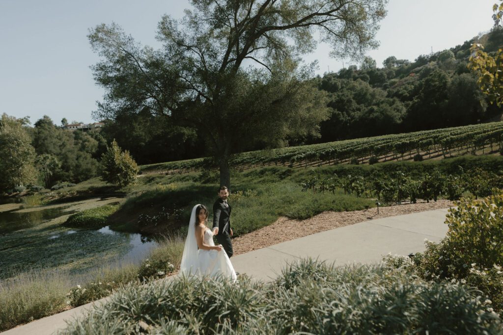Editorial bridal portrait with vineyard backdrop at Monserate Winery in Fallbrook