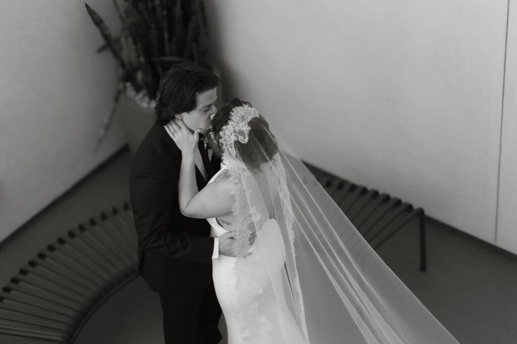 Bride and groom during their first look in warm desert light at The Drift Palm Springs.