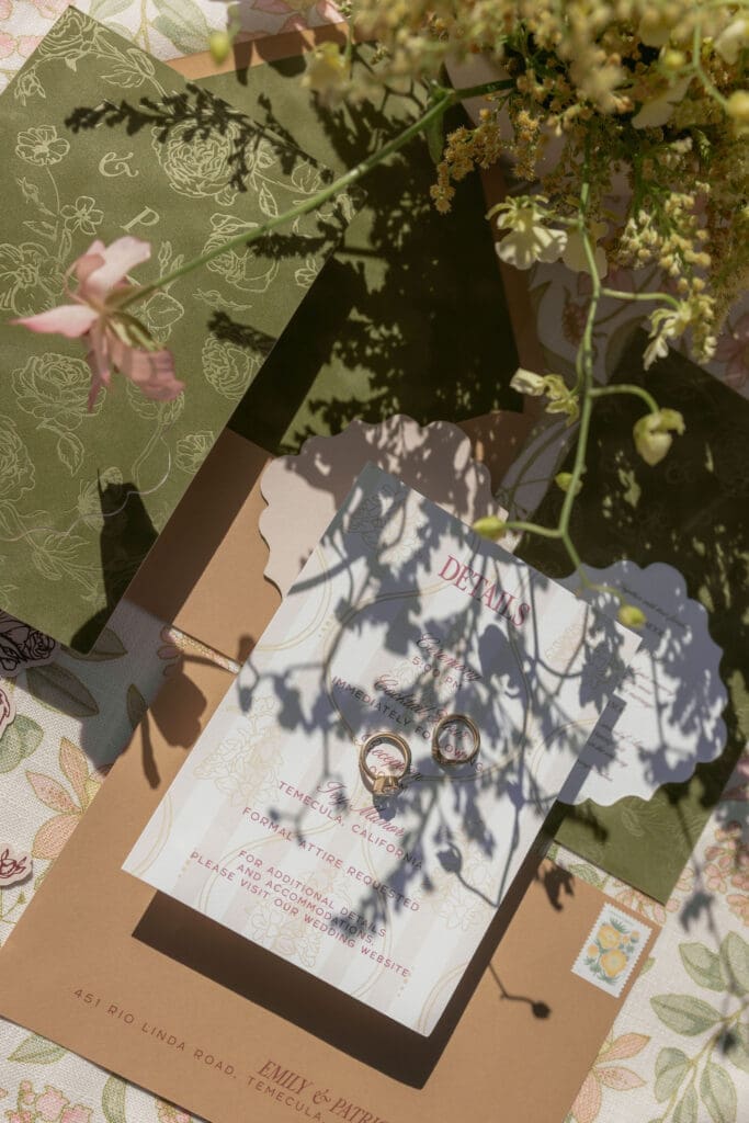 Wedding invitation flat lay and details photographed at Ivy Manor wedding venue