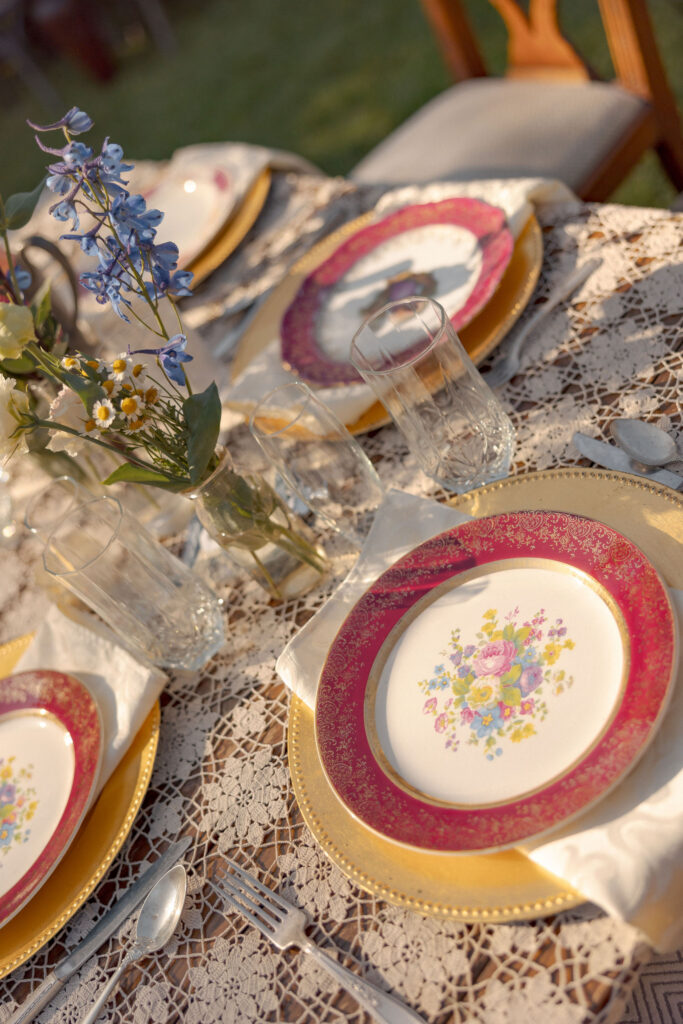 Wedding tablescape with floral centerpieces at Faulkner Farm in Santa Paula.
